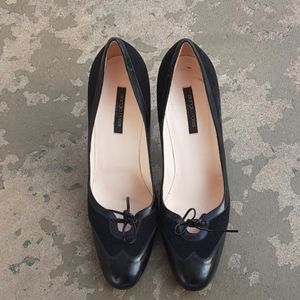 Shoe leather and suede  pump were one time size 41